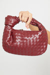 Wine Faux Leather Woven Knot Top Handle Mini Bag