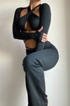 Black Slinky Cut Out Detail Tie Back Halter Crop Top